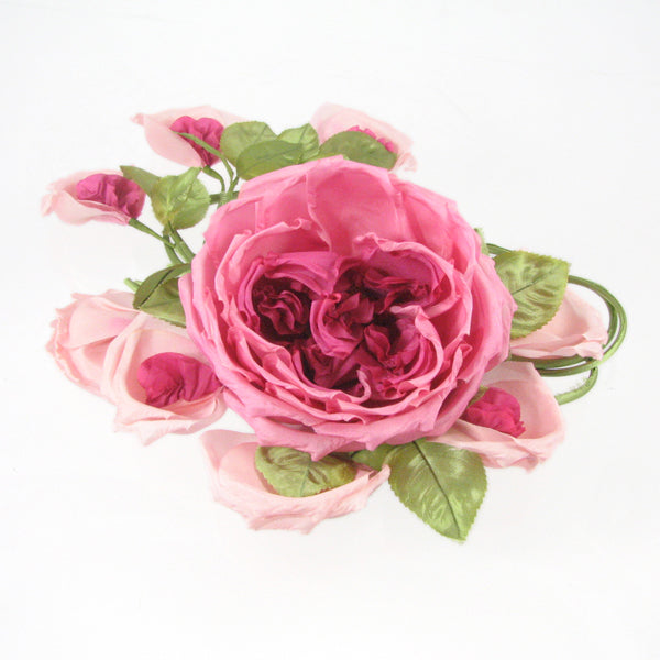 A beautifully handcrafted silk rose piece designed for hair or brooch styling.