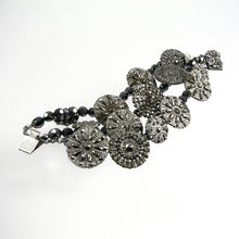 Load image into Gallery viewer, Victorian cut steel button collection bracelet.